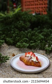 Strawberry Cream Cheese Croissant In A Round Plate