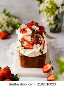 Strawberry and cream cheese summer cake on white marble board. Homemade summer dessert in spring decoration. brunch ideas. easter dessert. - Shutterstock ID 2109810023