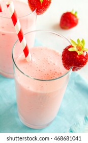 Strawberry delicious smoothie with yogurt in glasses close up