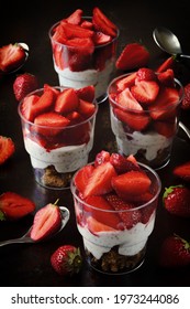 Strawberry desserts in cups. Summer snack strawberry yogurt granola. - Shutterstock ID 1973244086