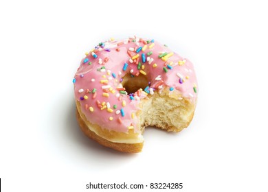 Strawberry donut with a bite taken out on white background
