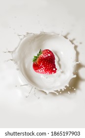 Strawberry Falling Into Milk Splash