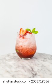 Strawberry Fizz In Glass On White Background.