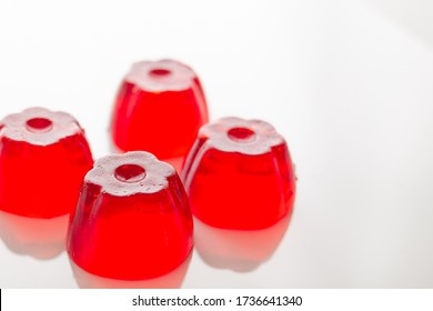 strawberry gelatine showing in a white background