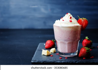Strawberry hot white chocolate with whipped cream and strawberries. toning. selective Focus