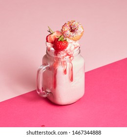 Strawberry Ice Cream Alcoholic Freakshake in Jar on Pink Background - Powered by Shutterstock