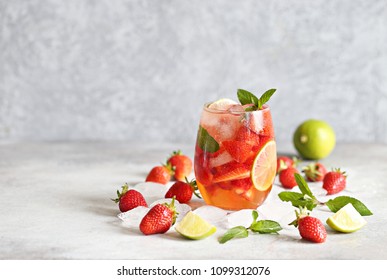 Strawberry Infused Water, Coctail, Lemonade Or Tea. Summer Iced Cold Drink With Strawberry, Lemon And Mint. Selective Focus