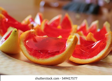 Strawberry Jello Shooters In Orange Peel 