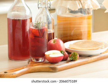 strawberry Kombucha Fermented Beverage and scoby in the bottle. fermented drink tea. Healthy and natural probiotic. - Shutterstock ID 2066075189