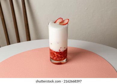 Strawberry latte on pink matte - Shutterstock ID 2162668397