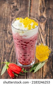 Strawberry, Lemon And Bubble Tea Milkshake Or Smoothie On Wooden Table