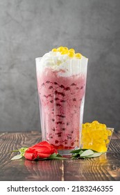 Strawberry, Lemon And Bubble Tea Milkshake Or Smoothie On Wooden Table