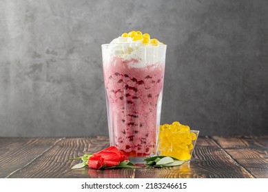 Strawberry, Lemon And Bubble Tea Milkshake Or Smoothie On Wooden Table