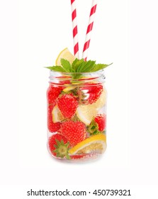 Strawberry Lemonade With Lemon Slices. Drink In A Glass Jar. Homemade Lemonade Isolated On White Background. Drinks For A Party.
