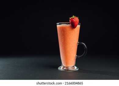 Strawberry Mango Smoothie On A Dark Background