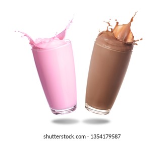 Strawberry milk and chocolate milk splashing out of glass isolated on white background.