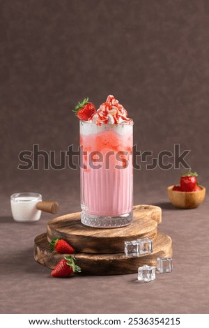 Similar – Image, Stock Photo Strawberry milkshake topped with whipped cream, minimalist on a green background