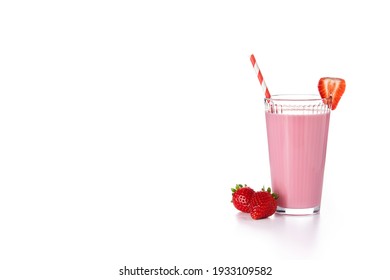Strawberry milkshake on pink background. Copy space