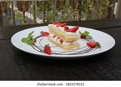 Strawberry Mille Feuille Cake In White Plate.