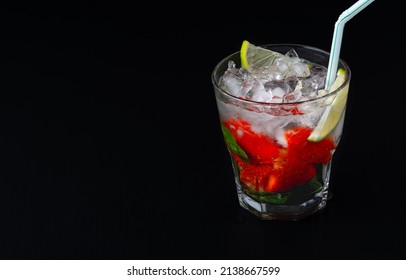 Strawberry mojito. Refreshing summer drink with berries, lime and min