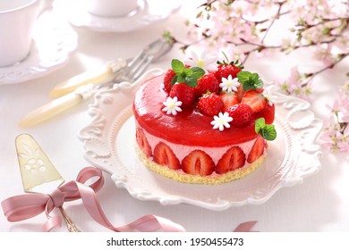 Strawberry mousse cake with fresh straw berry. 
Home made fraisier cake with beautiful cherry blossom.