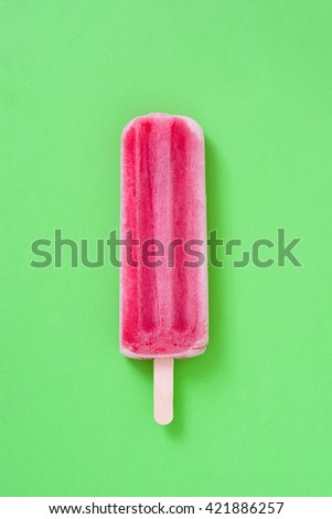 Similar – Foto Bild Erdbeer-Popsicle auf schwarzem Stein