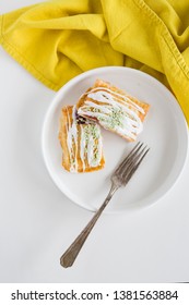 Strawberry Poptart With Icing And Green Sprinkles On White Background