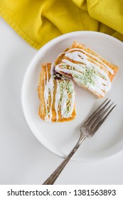 Strawberry Poptart With Icing And Green Sprinkles On White Background