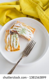 Strawberry Poptart With Icing And Green Sprinkles On White Background