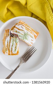 Strawberry Poptart With Icing And Green Sprinkles On White Background