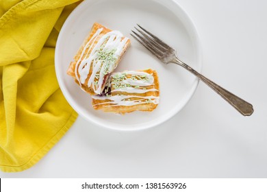 Strawberry Poptart With Icing And Green Sprinkles On White Background