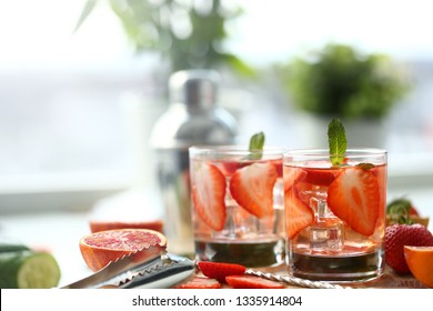 Strawberry Punch Home Made Cocktail Closeup On Wood Background