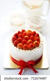 Strawberry ShortCake With Afternoon Tea Set On White Background