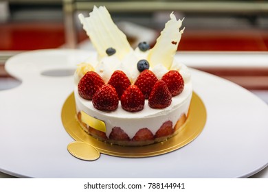 Strawberry Shortcake Cheesecake On Golden Paper With Many Fresh Red Strawberry At Cafe In Otaru, Hokkaido, Japan.