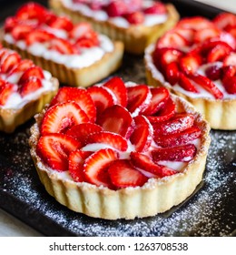 Strawberry Shortcake Pies (Strawberries Tartlet) On Black Background, Perfect Party Individual Fresh Fruit Dessert. Square.