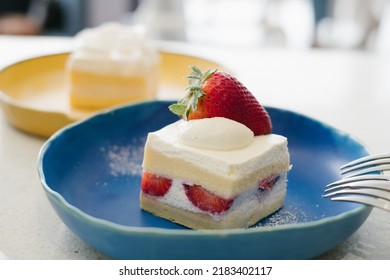 Strawberry Shortcake Recipe on blue plate in little room. - Powered by Shutterstock