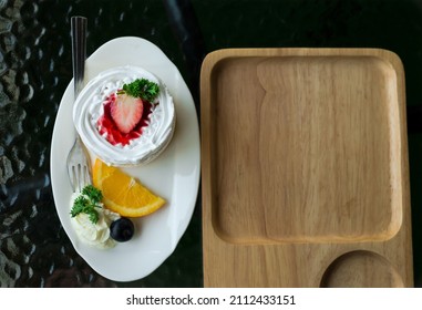 Strawberry Shortcake With Wood Serving Tray On Dark Background, Copy Space On Plate