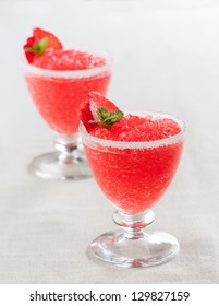 Strawberry Slushie Cups Decorated With Mint On Wooden Table