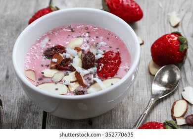 Strawberry Smoothie Bowl With Coconut Almonds Chia Seeds, Selective Focus