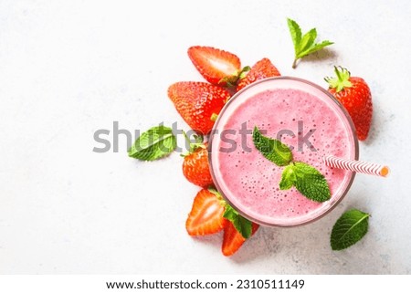 Similar – Image, Stock Photo Strawberry milkshake topped with whipped cream, minimalist on a green background