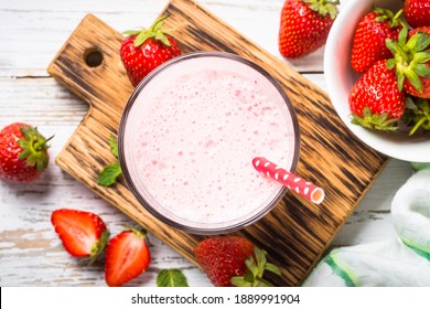 Strawberry Smoothie Or Milkshake. Top View With Fresh Berries.