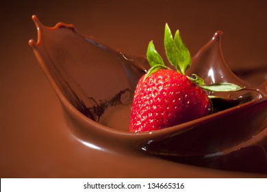 Strawberry Splashing in Milk Chocolate - Shutterstock ID 134665316