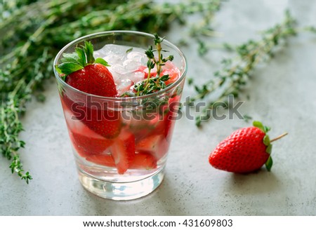 Strawberry and thyme cocktail, alcoholic or non-alcoholic drink or infused water