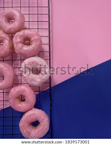 Strawberry and white choc donuts