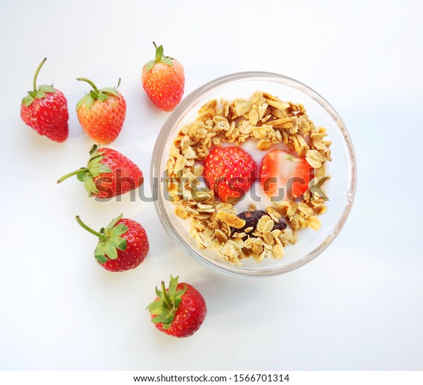 Download Strawberry Yoghurt Muesli On Glass Cup Stock Photo Edit Now 1566701314 Yellowimages Mockups