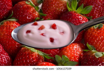 Strawberry Yogurt Cream Spoon With Strawberry Fruit Pieces On