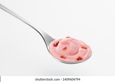 Strawberry Yogurt With Strawberry Pieces In A Spoon On White Background