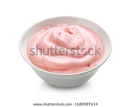 Strawberry yogurt, pink berry cream in bowl isolated on white background with clipping path