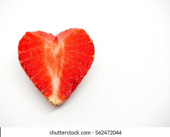 Strawberry's dissect a heart shape on white background.