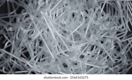 Straws made of plastic for drinking. Disposable plastic spinning on the table. Background, for Say no to plastic campaign and awareness. Pollution of the environment and ecology. Plastic straws ban. - Powered by Shutterstock